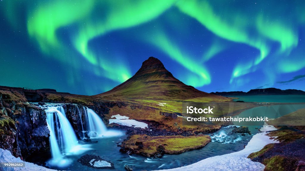 Northern Light, Aurora borealis at Kirkjufell in Iceland. Kirkjufell mountains in winter. Iceland Stock Photo