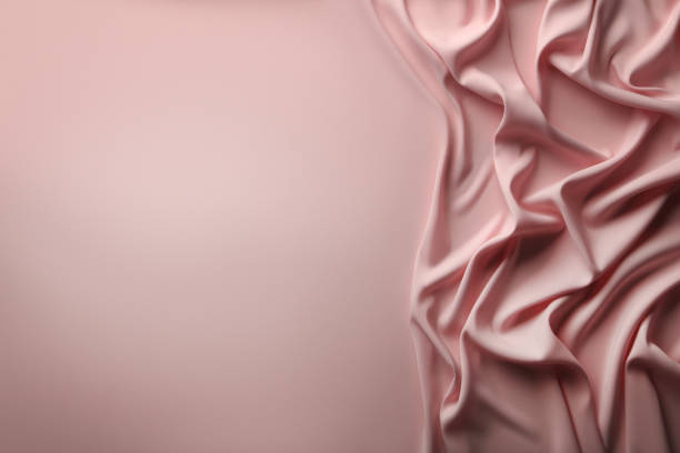 istock Background of pink satin fabric 992950294
