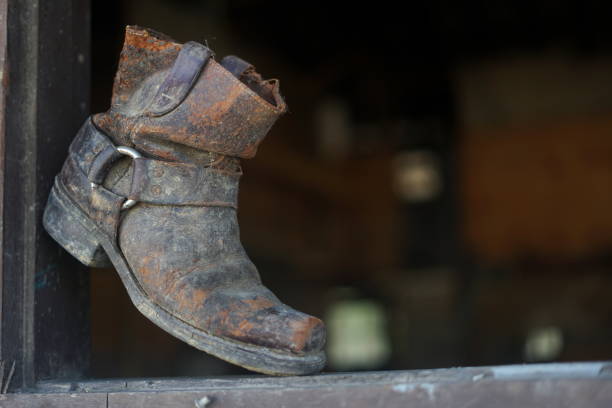 istock Old dusty vintage boot at abandoned building 992950308