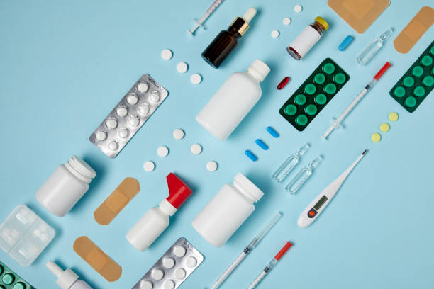 istock top view of various medical supplies composed in row on blue surface 992959268