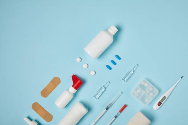 istock top view of various medical supplies on blue surface 992960304
