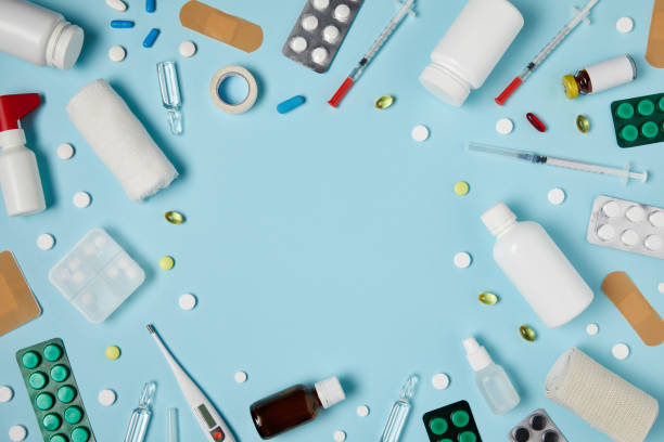 istock top view of frame made of different medicines on blue surface 992960830