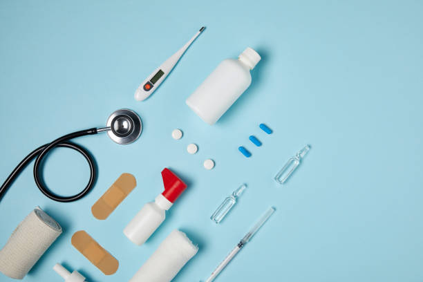 istock top view of different medical supplies on blue surface 992961184