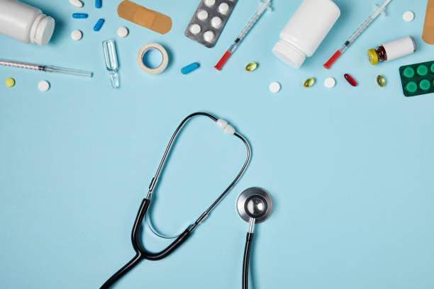 istock top view of stethoscope and different medicines on blue surface 992970984