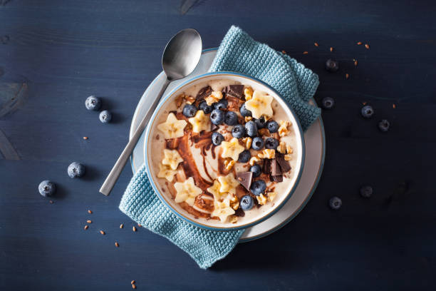 istock healthy banana smoothie bowl with blueberry chocolate walnuts 992971274