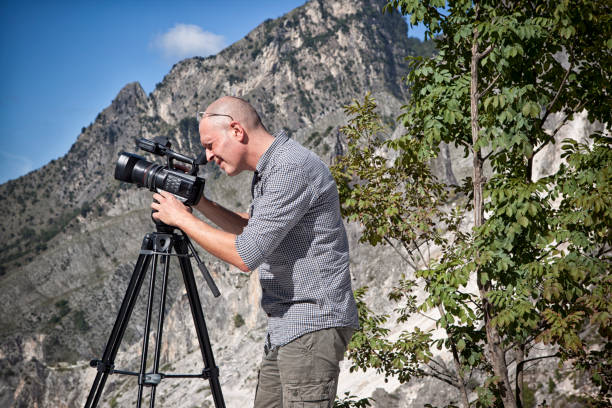 istock Cameraman in Italian marble Quarry 992976430
