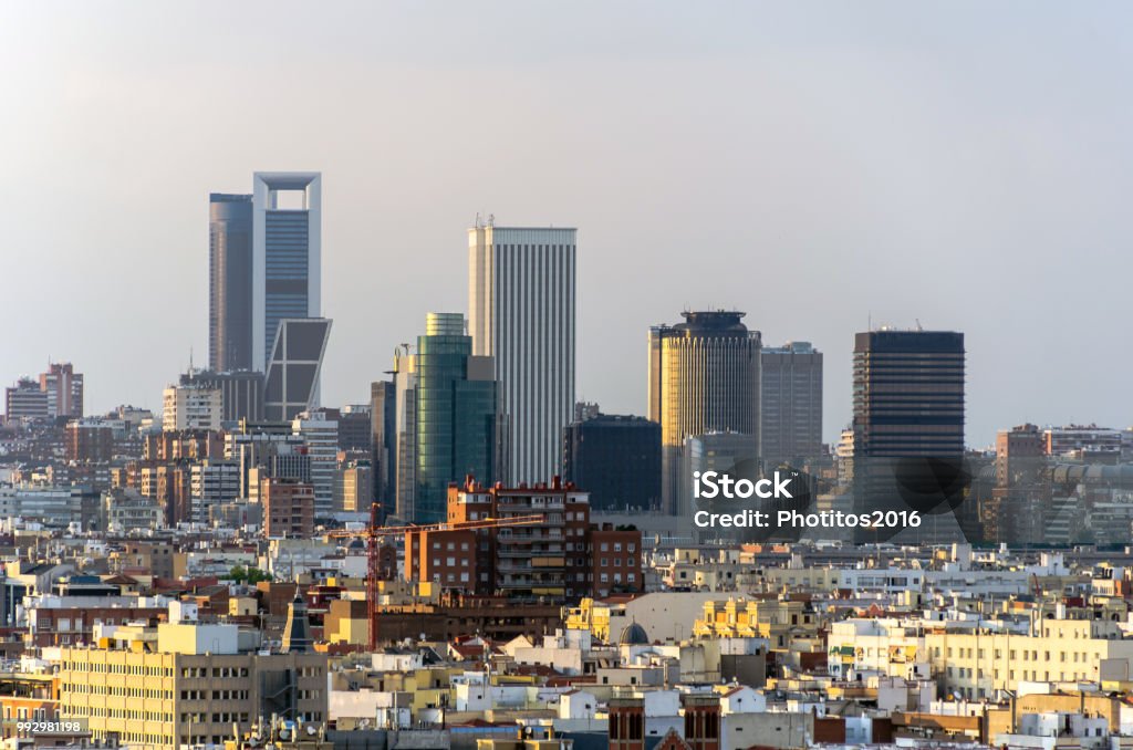 Madrid financial district Madrid, view of financial district with the most known modern skyscrapers and office buildings at sunset. cityscape, skyline, landmark Madrid Stock Photo