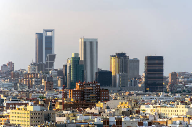 Madrid financial district Madrid, view of financial district with the most known modern skyscrapers and office buildings at sunset. cityscape, skyline, landmark madrid stock pictures, royalty-free photos & images