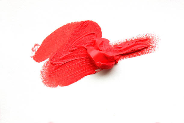 istock Smears lipsticks close-up isolated on white background. Make-up, beauty. 992985786