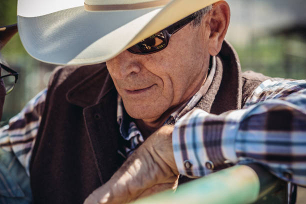 lifestyle: smiling and happy farmer. old farmer is happy in the countryside.