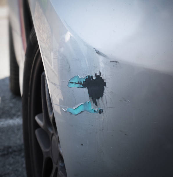 istock Scratched car with deep damage to the paint 993016818