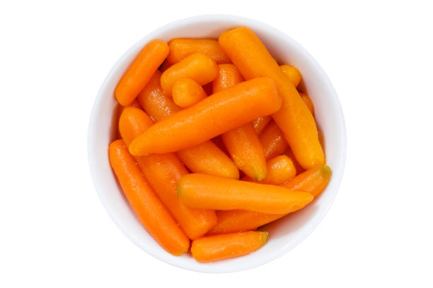 Carrots baby carrot vegetable vegetables from above bowl isolated