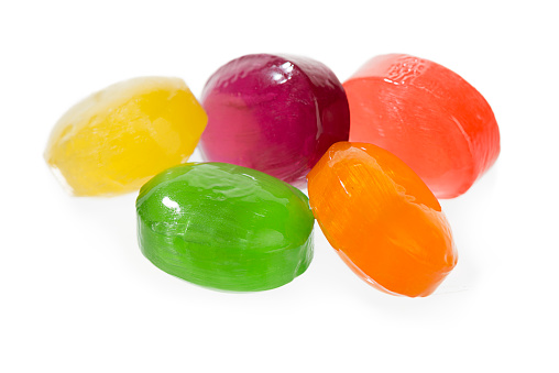 Close-up of hard candies isolated on white background.