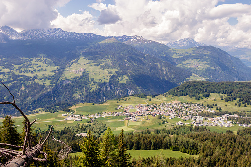 View to the village of Lenzerheide and Valbella with mountains of the swiss alps, Switzerland