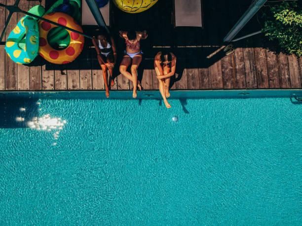 relaxing by the pool - bikini summer vacations looking down imagens e fotografias de stock