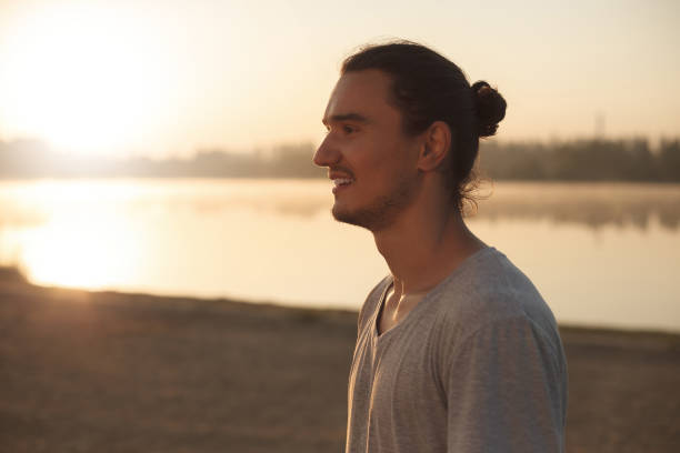 istock Handsome man resting after workout in the park 993118588