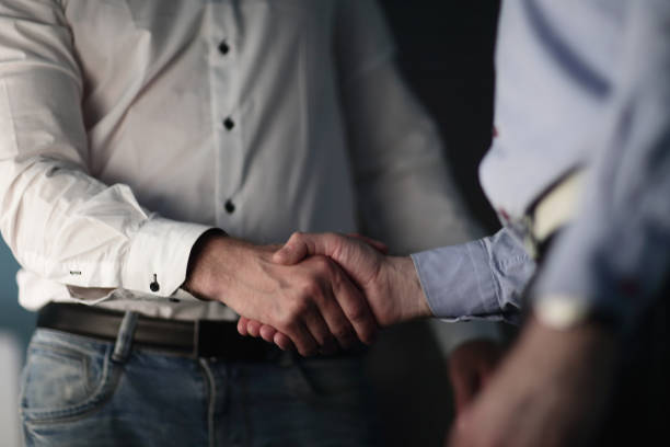 istock close up.business handshake business partners 993131612