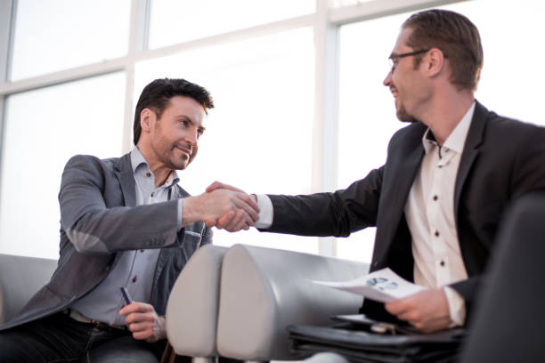 istock close up. handshake financial partners 993134010