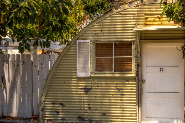 An old shed, weathered by time, stands silent with only one window. A common scene in rural America.