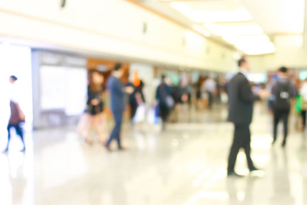 istock Business people activity standing and walking in the lobby blurred. 993156050
