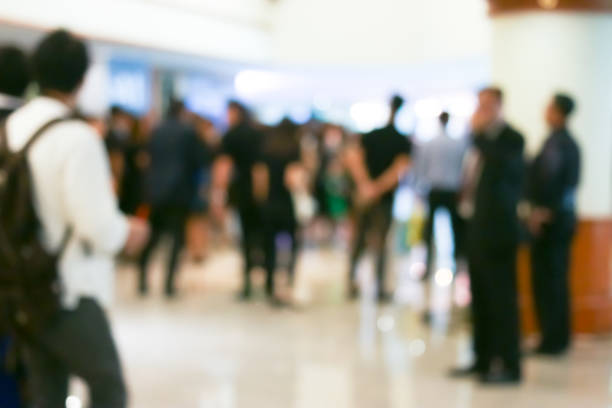 istock Business people activity standing and walking in the lobby blurred. 993156066