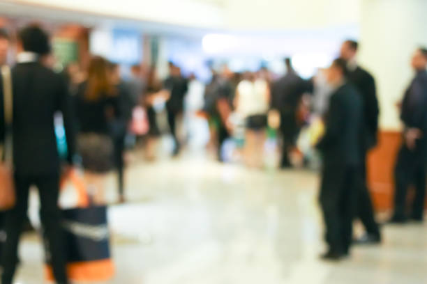 istock Business people activity standing and walking in the lobby blurred. 993156090