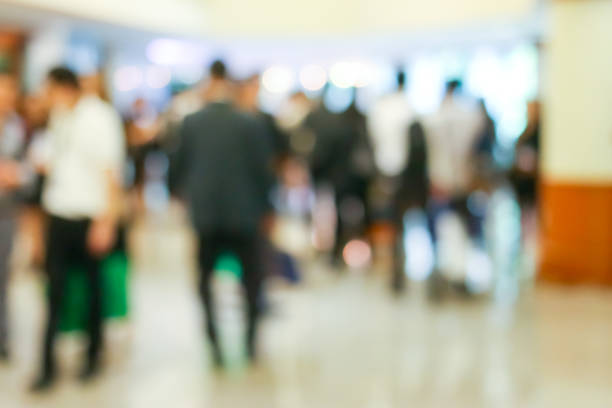 istock Business people activity standing and walking in the lobby blurred. 993156180