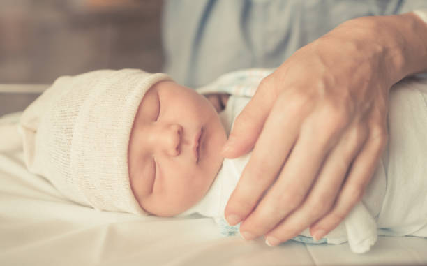 istock Newborn baby sleeping 993186118