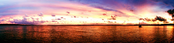 istock Magnificent bright cloud coastal sunrise Panorama. Australia. 993190636