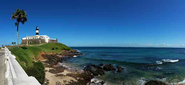 Panoramic photo of the famous Barra Lighthouse and Barra beach in the city of Salvador Bahia