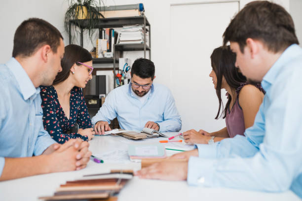 istock Group of architects planning and working in the office 993202396