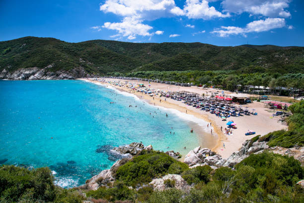 Beautiful Kalamitsii camping beach on the east coast of Sithonia, Halkidiki, Greece. Beautiful Kalamitsii camping beach on the east coast of Sithonia on Halkidiki, Greece. halkidiki beach stock pictures, royalty-free photos & images