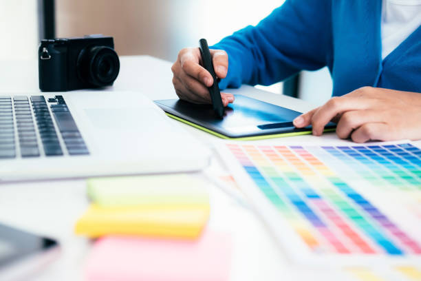 istock Graphic designer  and Photographer working 993205764