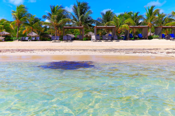 Beach with rustic gazebos and palapas, Montego Bay - Jamaica - Caribbean