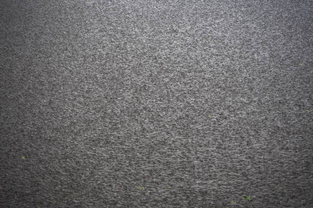 istock The surface of the water under the raindrops. 993249982