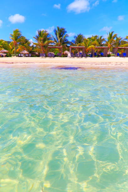 istock Beach with rustic gazebos on sand – Montego Bay - Jamaica, Caribbean 993264466