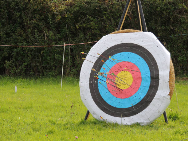 Archery Target Grouping With Arrows stock photo