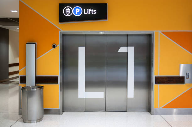 istock Elevator doors on level 1 floor of public building 993307832