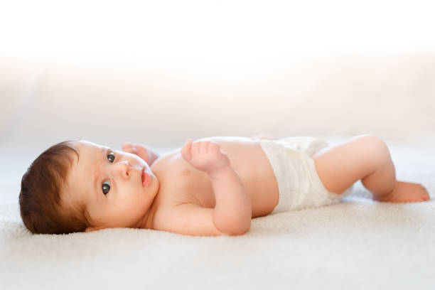 istock Cute baby resting on bed 993334546