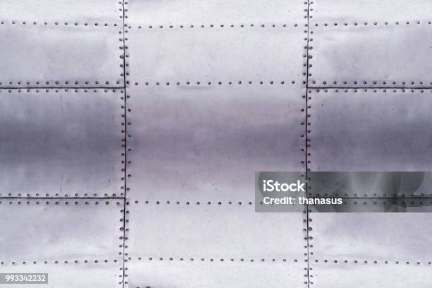 Detail Of Old Grunge Piece Of Metal Plate With Bolts Aluminium Surface Background Stock Photo - Download Image Now