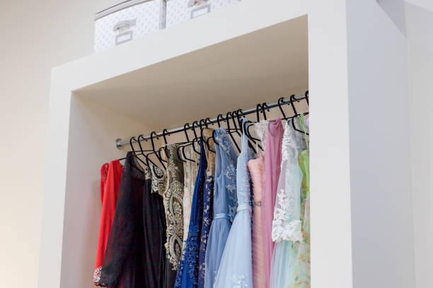 istock professional fashion designer studio. tailoring for evening, party, wedding dresses. sample dresses to try on, glamour clothing, tailoring to order according to your measurements, rent dresses 993353900