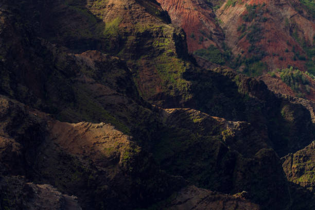 istock Rocks with dramatic lighting at Waimea Canyon State Park in Kauai, Hawaii 993359134