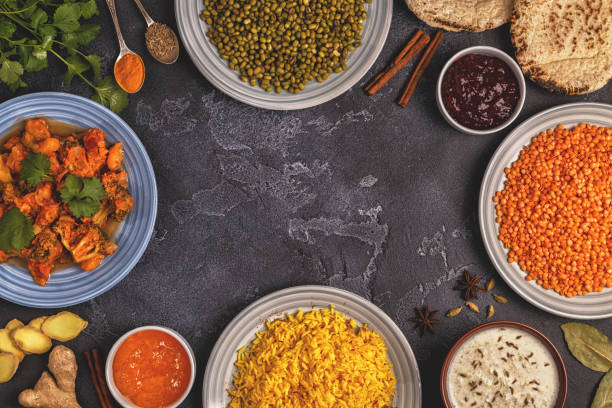 istock Traditional Indian curry with rice, lentils and mung beans. 993362228