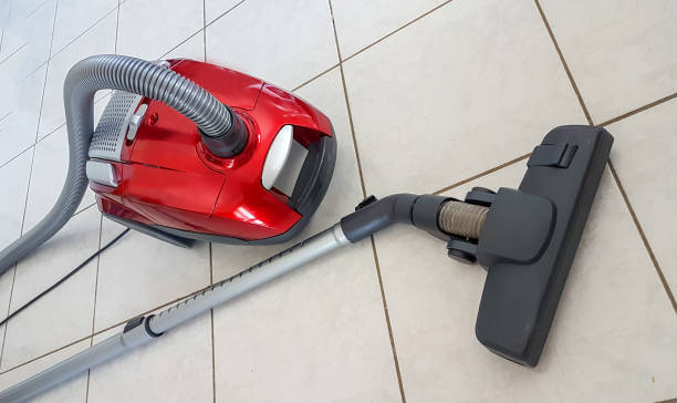 istock vacuum cleaner on the floor  red color 993366278
