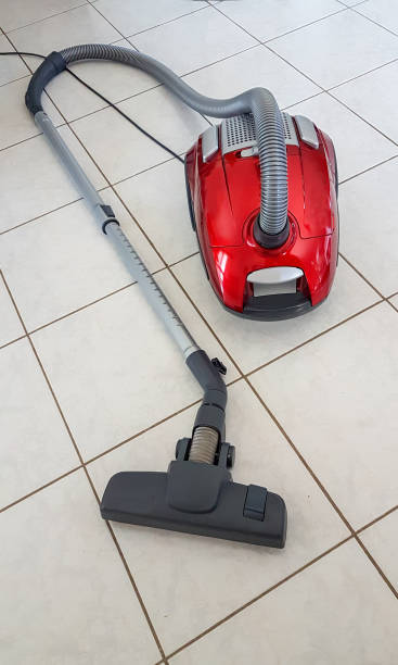 istock vacuum cleaner on the floor  red color 993366994