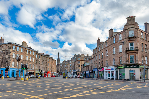 Edinburgh, Scotland - April 2018: Early 19th century Victorian tenement flats and historic buildings on Tollcross, a major road junction to the south west of the city centre of Edinburgh in Scotland, UK