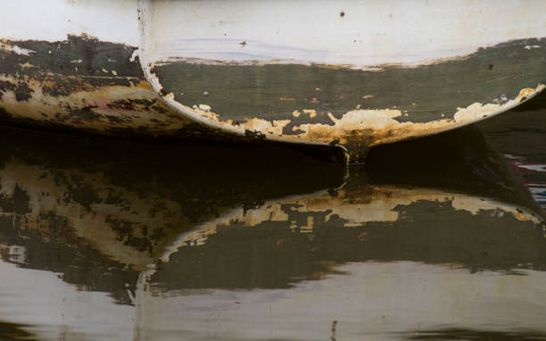 istock Bottom of boat reflected in water 993400820