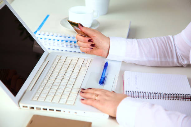 istock Young businesswoman working on a laptop 993419296