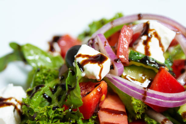istock fresh vegetable salad  with balsamic cream, feta and olives 993426570