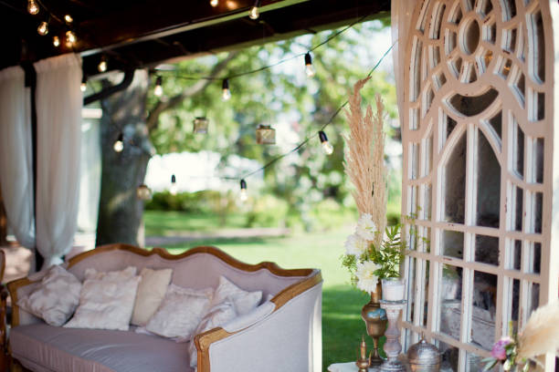 istock wedding lounge zone with sofa, boudoir table and lights 993432538